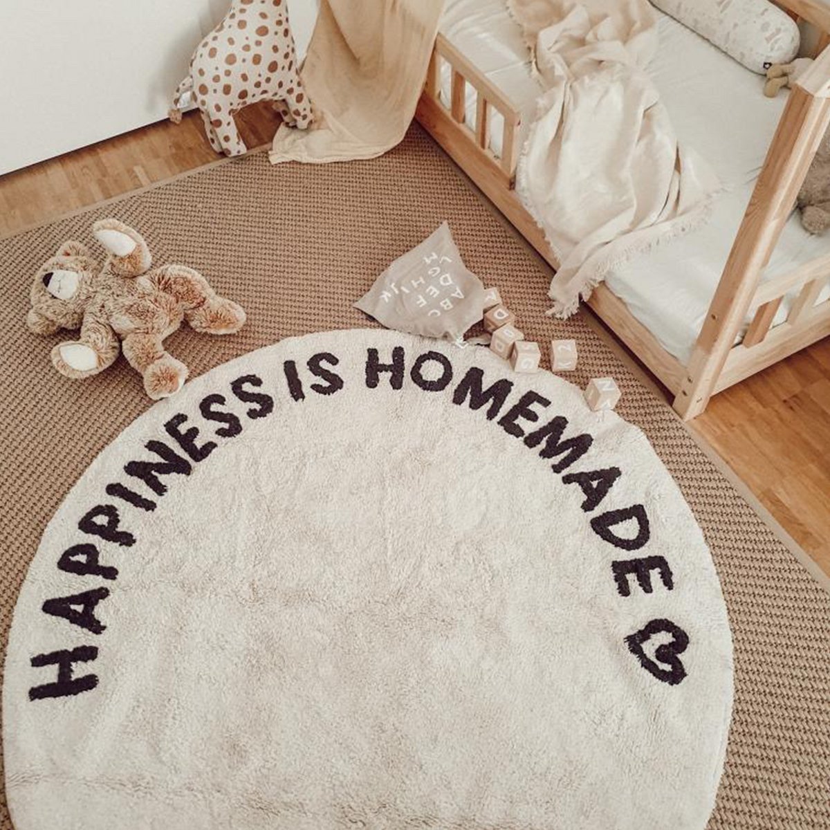 Rond geweven vloerkleed Happiness is homemade